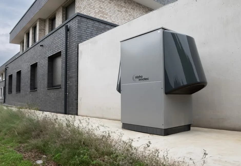 Heat pump outdoor unit installed beside a home in Ontario